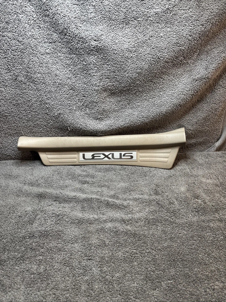 Lexus LX470 2000 moldura, placa de umbral de puerta trasera izquierda, bronceado 67918-60040 Foto 1 de 4