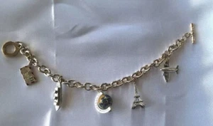 Bracciale Charm Silvertone Alta Qualità Viaggio/Parigi 7" Cinque Charms Lucido Forte - Foto 1 di 13