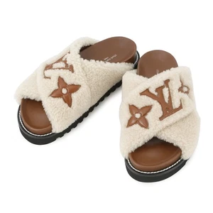 LOUIS VUITTON Paseo Flat Comfort Pantoletten Gr. 37 Lammfell/Leder Nude 1AA1VY - Bild 1 von 13