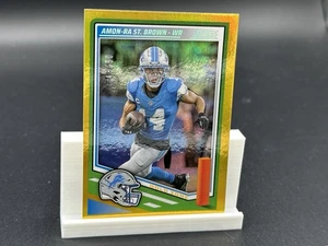 AMON-RA ST BROWN 2025 MARCADOR FÚTBOL ZONA DORADA #/50 LEONES - Imagen 1 de 4