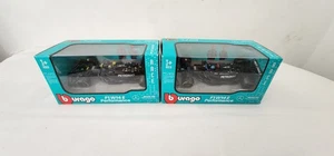1/43 Burago 2025 Lewis Hamilton & George Russell F1W15 PETRONAS AMGS - Picture 1 of 3