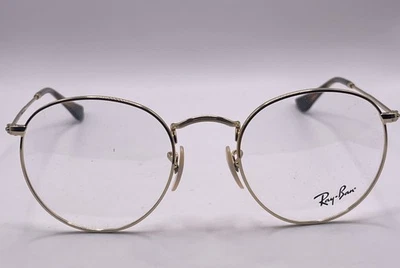 Marco de gafas Ray-Ban redondo de metal 2500 tono dorado. Templo 145mm. Foto 1 de 4