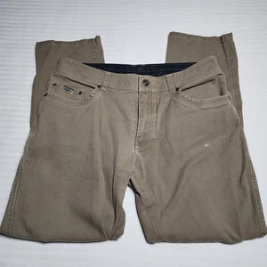 Pantalones de mezclilla Kuhl Kanvus 35x32 para hombre caqui marrón tostado elástico lona logotipo reforzado - Imagen 1 de 16