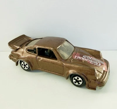 1981 Ertl винтажный Porsche 930 Turbo The Cannonball Run коричневый спортивный автомобиль 1/64 - Изображение 1 из 4