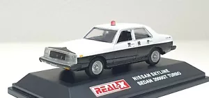Modellino auto pressofuso 1/72 Real-X NISSAN SKYLINE BERLINA 2000GT TURBO POLICE - Foto 1 di 3