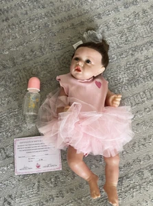 UCanaan Reborn Baby Doll Girl Brown Hair with Accessories Pink Outfit - Bild 1 von 9