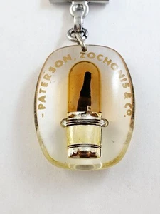 Keyring - Bourbon - Paterson, Zochonis & Co - Champagne - Mobile - 1960s - Picture 1 of 4