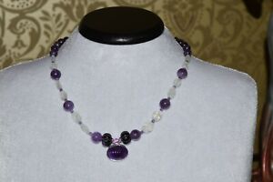 Handmade artisan necklace with natural amethyst