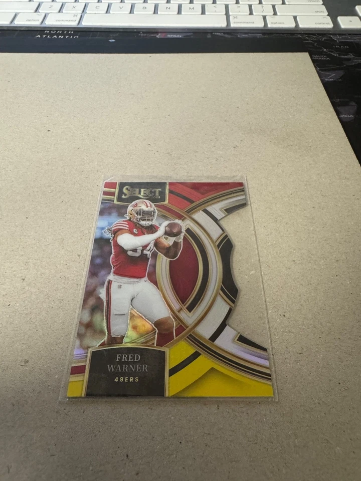 2023 Panini Select - Premier Level Fred Warner #195 Red & Yellow Prizm Die-Cut - Image 1 of 2