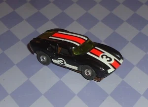AURORA THUNDERJET BLACK LOLA GT HO SLOT CAR T-JET - Photo 1/6