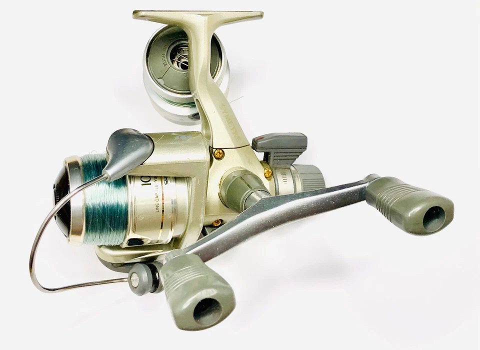 Shimano Twin Paddled Aero Symetre Spinning Reel 1000 Rear Drag / Made In Japan - Image 1 of 4