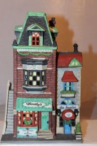 Dept 56 Natale in città - Negozio di vestiti di Dorothy - Foto 1 di 8