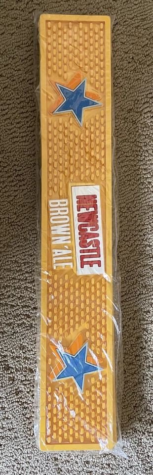 Newcastle Brown Ale ~ Beer Rubber Bar Rail Drip Mat 20” X 3.25” Yellow White Red - Image 1 of 1