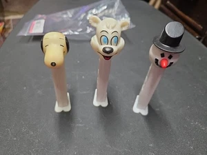 Lot of 3 Vintage PEZ Candy Dispenser Snoopy Snowman Bear Feet Collectible - Picture 1 of 4