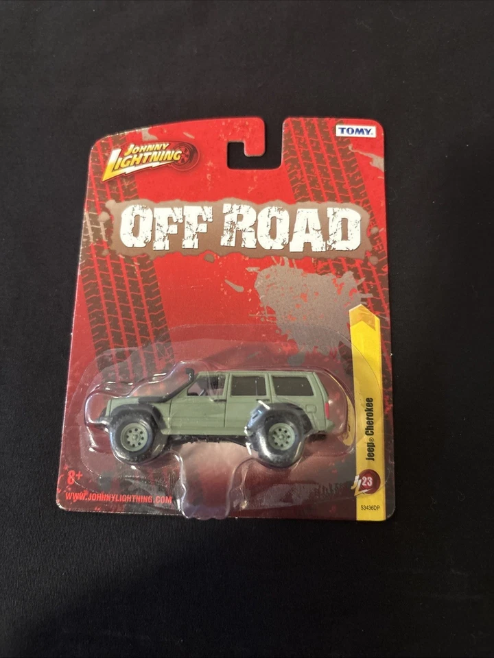 Jeep Cherokee Tommy JL23 A12 todoterreno Johnny Lightning Foto 1 de 4
