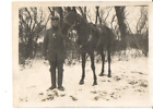 Foto , 1 WK , Kavallerist mit Pferd im Winter, E39