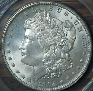 1904 O Morgan Silver Dollar ANACS MS 63 - Picture 1 of 3