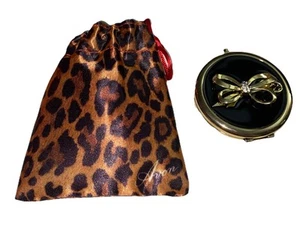 *NEU*AVON*RUNDER KOMPAKTER SPIEGEL*SCHWARZ*GOLD*LEOPARDENBEUTEL*STRASS*SCHLEIFE*VTG* - Bild 1 von 6
