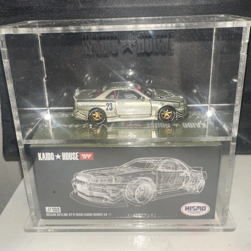 Kaido House x Mini GT #103 Nissan Skyline GT-R (R34) exhibido en estuche acrílico  Foto 1 de 3