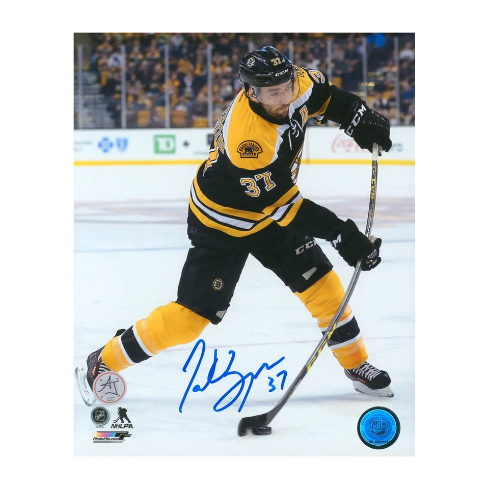 Fotografía 8x10 firmada autografiada por Patrice Bergeron Boston Bruins de la NHL hockey Foto 1 de 1