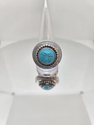 Anillo de plata de ley con halo de madreperla cara turquesa tallada Foto 1 de 3