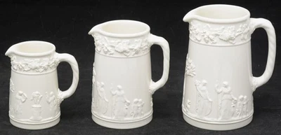 Wedgwood Queensware Embossed Sacrifice Cream on Cream 3 Graduated Pitchers 1960s - Image 1 of 4