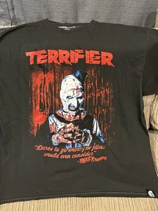 Terrifier X Bloody Disgusting Glow In The Dark Horror Tshirt Gr. Extra Large - Bild 1 von 3