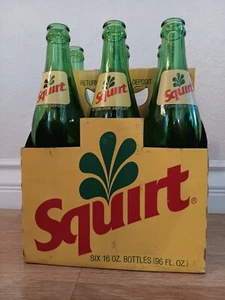 Retro Squirt 6 Pack Bottles 16oz Green With Yellow ACL 1980s With 1 7up Bottle - Picture 1 of 18