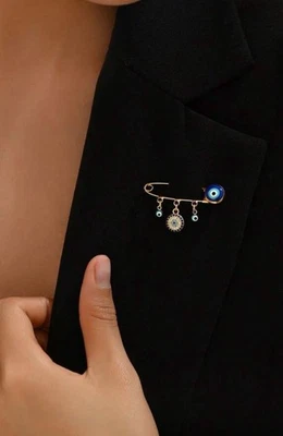 Broche broche broche de protección para bebés recién nacidos enchapado en oro Foto 1 de 4