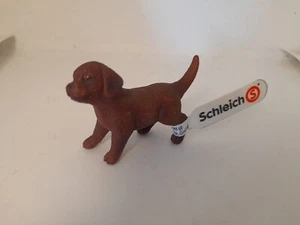 SCHLEICH aus SCHLÜMPFE 13835 HUND DOG LABRADOR BRAUN BABY pensioniert - Bild 1 von 2