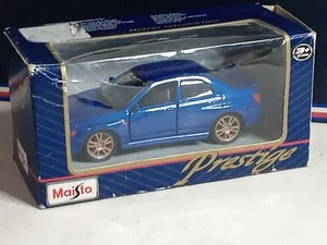 MAISTO 1/40 SUBARU IMPREZA EN TRES BON ETAT DANS SA BOITE USAGEE pa G12 - Picture 1 of 6