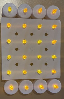 Velas de luz de té LED sin llama alimentadas por batería Etronic - Paquete de 24 Foto 1 de 4