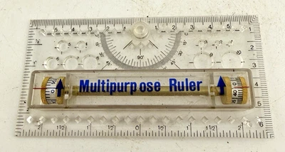 Vintage Multi Purpose Drafting Rolling Brass Ruler Clear w/ Blue Text 5.25" Long - Image 1 of 4