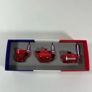Le Creuset Christmas Ornament Red Cerise Set with Mini Mug, Teapot & Dutch Oven - Picture 1 of 9