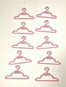 Paquete de 10 perchas Barbie rosa con lazo - Imagen 1 de 3