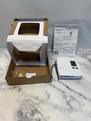 Honeywell 5-2 Day Programmable Line Volt Thermostat (RLV4300A) - Image 1 of 2