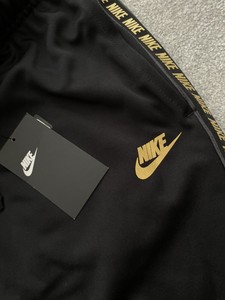nike oro uomo