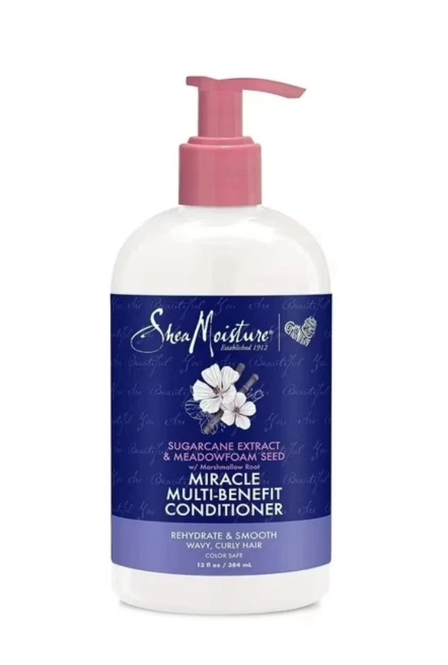 HUMEDAD DE KARITÉ Caña de Azúcar Espuma de Prado MILAGRO MULTI BENEFICIO Acondicionador 13 oz Rizado Foto 1 de 4