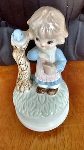 VINTAGE PORCELAIN MUSIC BOX - BOY WITH A BLUE BIRD - Picture 1 of 2