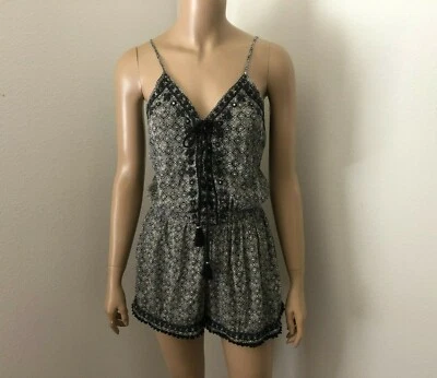 Mameluco campesino estampado American Eagle talla pequeña borlas bordadas negras  Foto 1 de 4