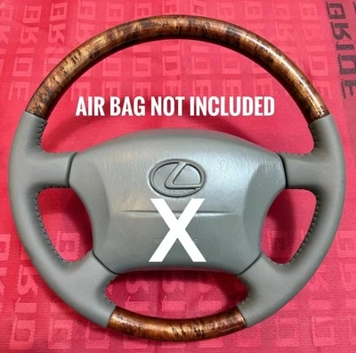 Volante LEXUS LX470 98-2007 OEM con grano de madera y cuero cosido Foto 1 de 4