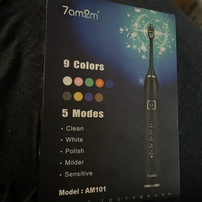 Cepillo de dientes eléctrico sónico Foto 1 de 2