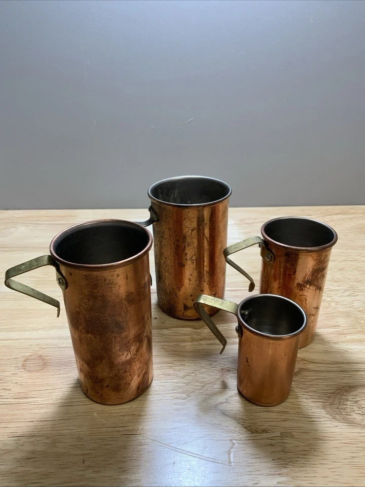 4 copos líquidos antigos de cobre altos empilháveis para medição da década de 1970 - Imagem 1 de 4