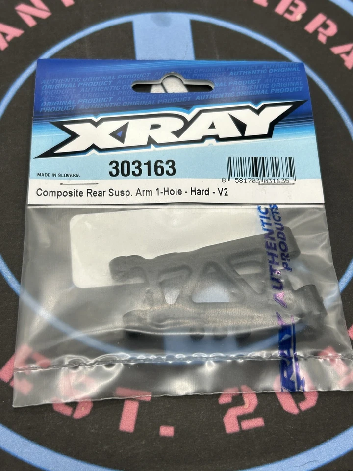 XRay. 303163 rear suspension arm - hard - 1-hole - v2 - Image 1 of 1