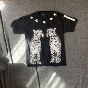 Camiseta sin mangas Dfynt para hombre Leopardo y estrellas 100 % algodón negra mediana - Imagen 1 de 6