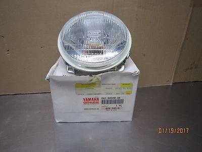 YAMAHA FZR600 FZR1000 86-99 LENTE FARO Lado Izquierdo OEM 2AX-84320-A0 NUEVO Foto 1 de 3