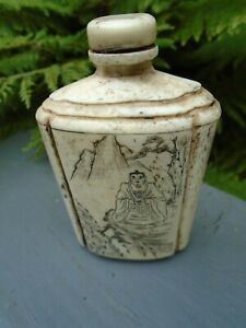 Chinese perfume/snuff bottle with writing to back and Buddha in mountain