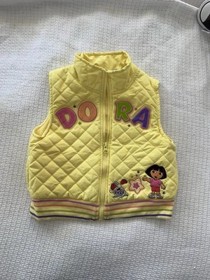 Chaleco acolchado Nickelodeon Dora la Exploradora amarillo, talla 5x Foto 1 de 4