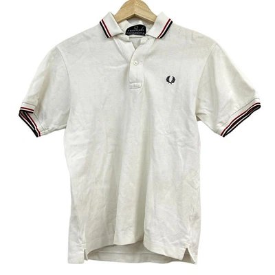 Auténtica camisa polo para hombre FRED PERRY - blanca negra roja Foto 1 de 4