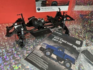 NEW Axial SCX10 III 1/10 Base Camp 1982 Chevy K10 Crawler Slider Chassis W/Motor - Picture 1 of 8